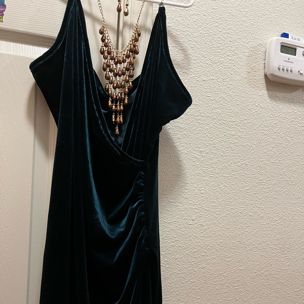 velvet green dress if u want the necklace and earrings also add $25